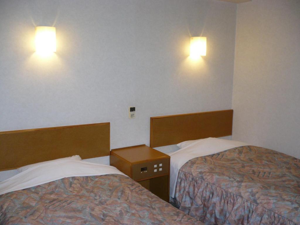 Hotel New Budget Muroran Værelse billede