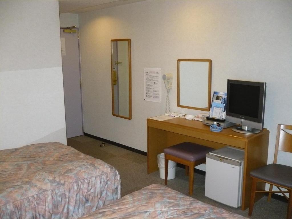 Hotel New Budget Muroran Værelse billede